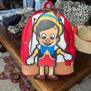 Bundle to save w/free shipping. Loungefly Pinocchio Mini Backpack